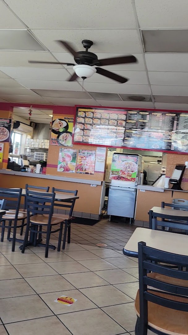 Fast-service restaurant space with a clean counter.