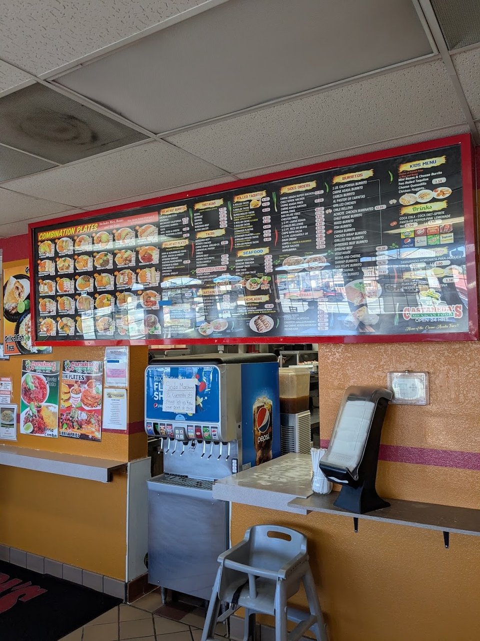 Printed menu with burritos and quesadillas.